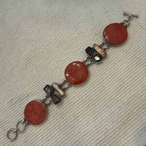 Red, brown and silver bracelet